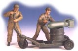 U.S. mechanics putting a bomb
